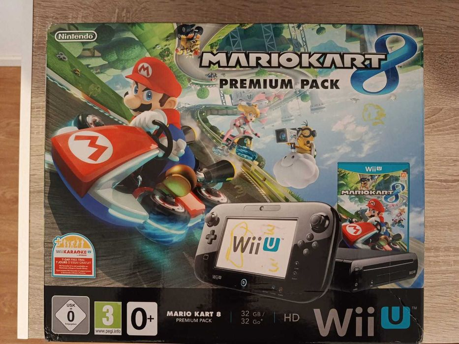 Nintendo Wii U em caixa com manuais