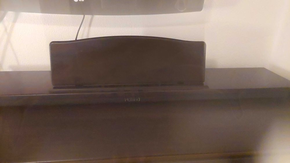 Piano digital Roland HP102e