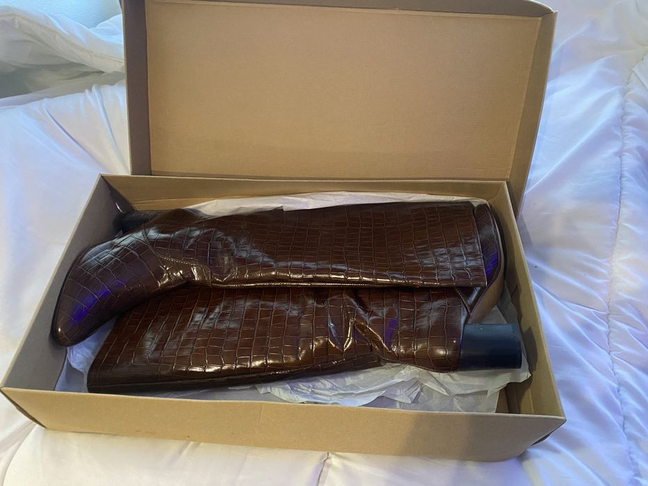 Botas em pele castanhas