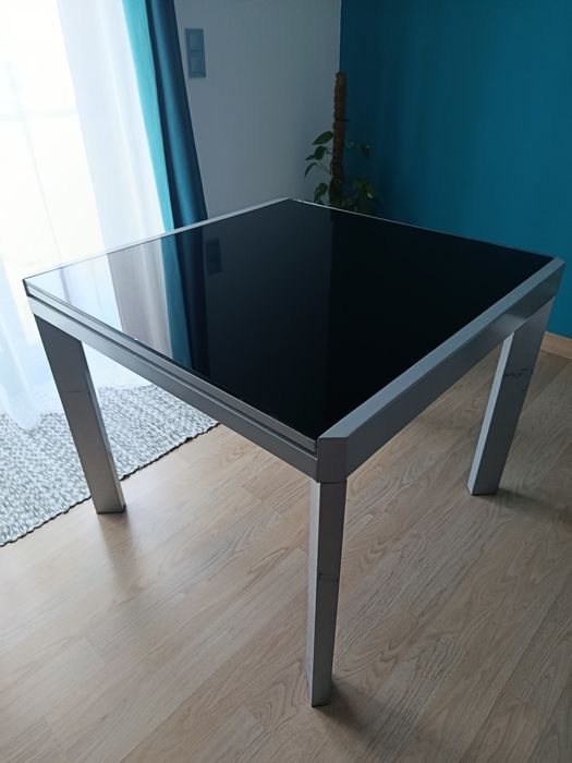 Mesa extensivel de estrutura de ferro com tampo de vidro temperado