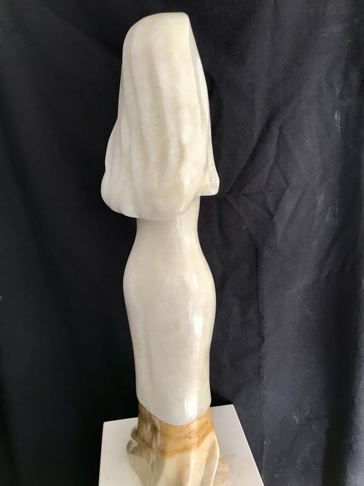 Escultura em pedra onix