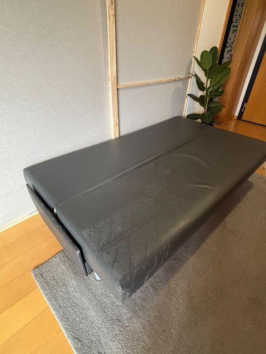 Sofá cama cinzento