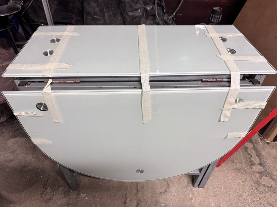 Mesa de vidro extensível