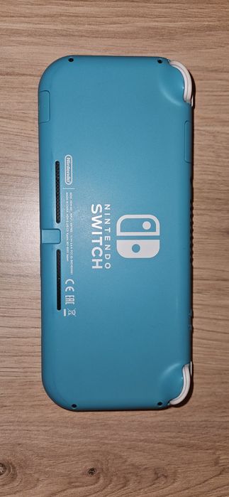 Nintendo Switch Lite + EXTRAS