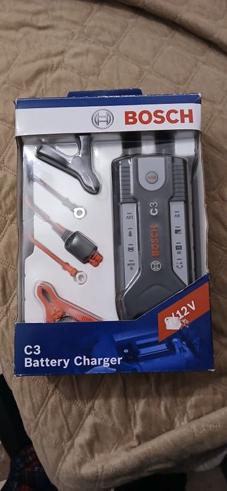 Vendo carregador de batarias bosch C3