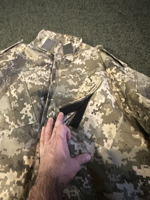 Демисезонный камуфляжный костюм.