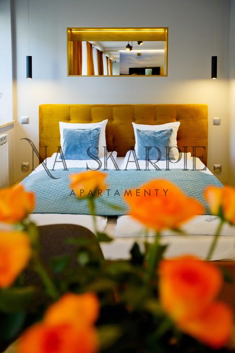 Apartament Na Skarpie 1 - noclegi nad jeziorem, promenada, Mazury