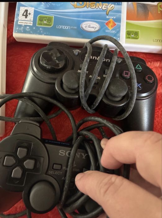 Playstation 2 com comandos e microfones