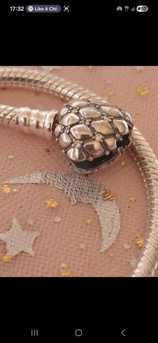 Pulseira prateada para berloques