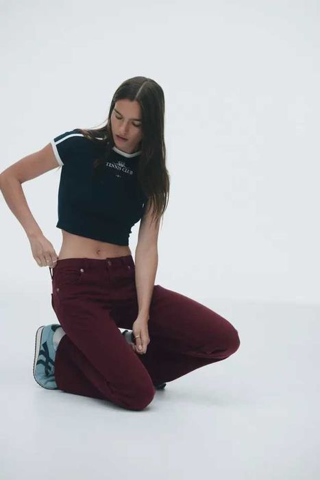 Spodnie dżinsowe 36 nowa kolekcja Flared Low Jeans PROMOCJA DIVIDED