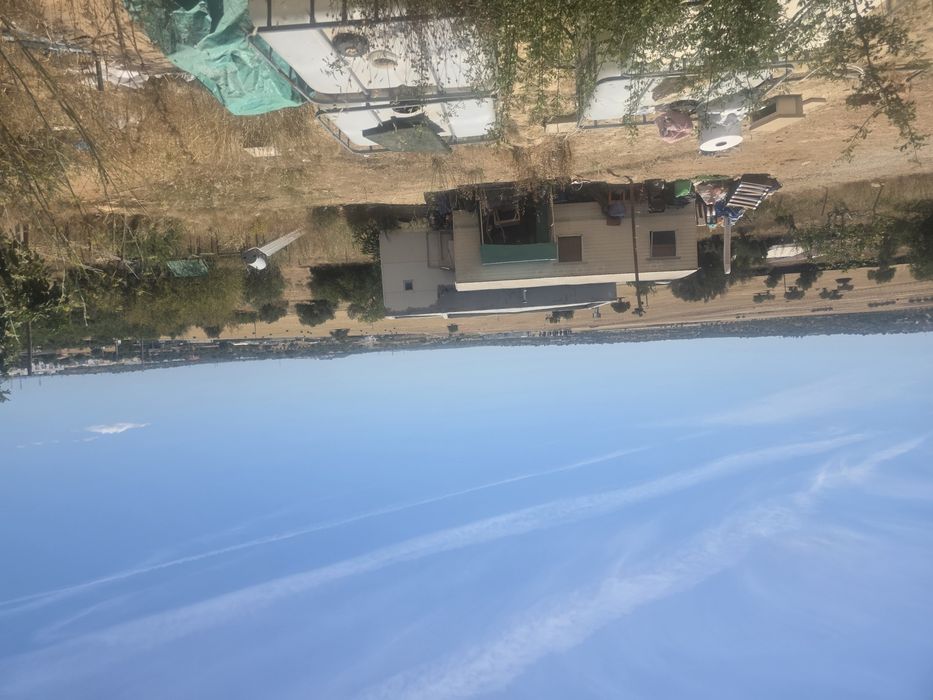 Terreno com casa modelar