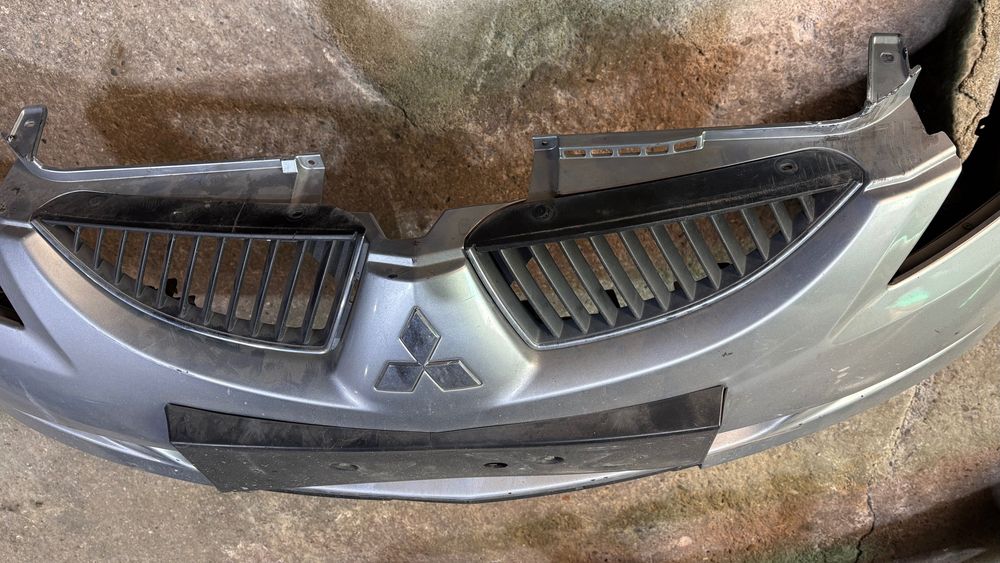 Pára Choques frente Mitsubishi Lancer 2004