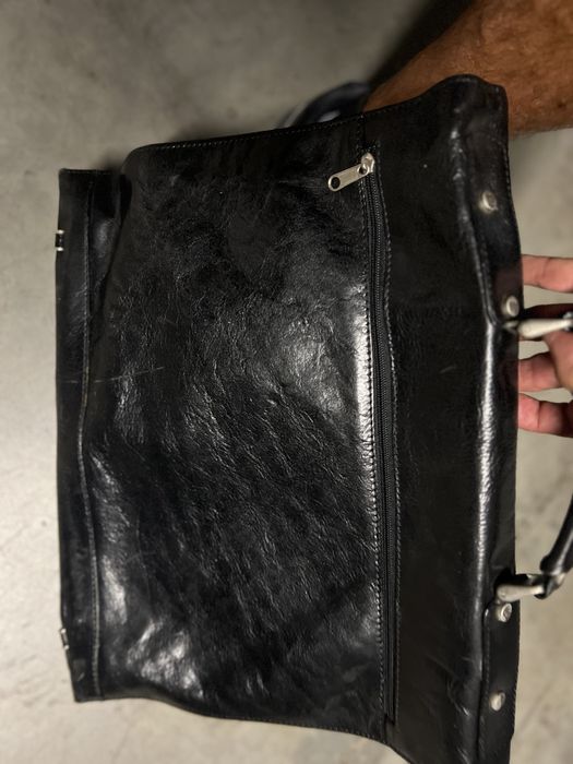 Mala em couro como nova . Usada poucas vezes