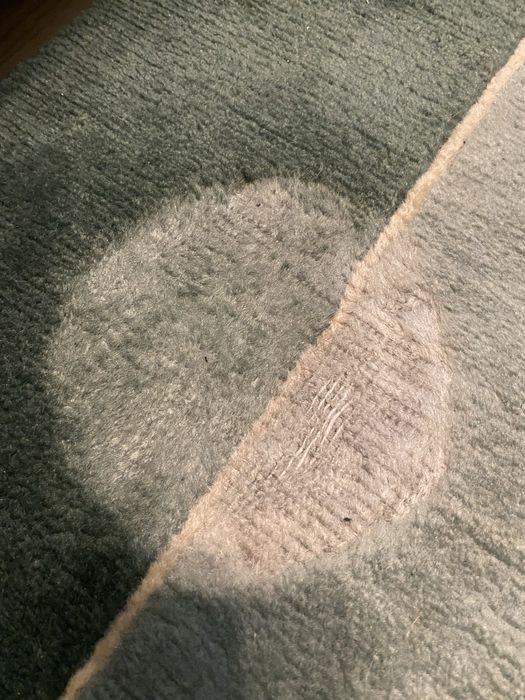 Dywan wełniany z drobną wadą