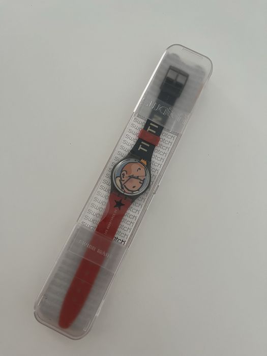 Relógio Swatch Gent “Les Aventures de Tintin” (referência GM165)