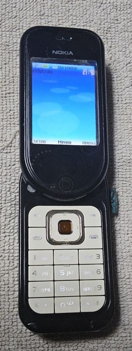 Мобильный телефон Nokia 7373,заряд,статуэтка,sharp,