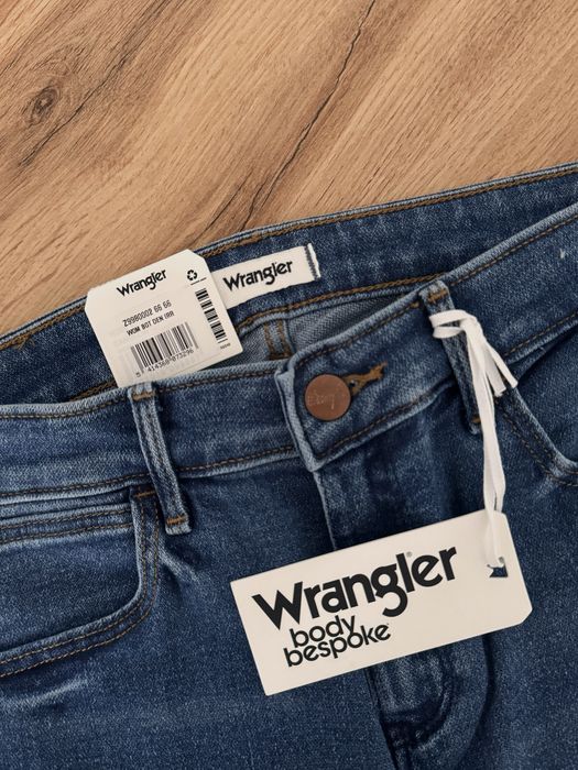 Jeansowe spodnie dzwony Wrangler Boot Cut W27 L32