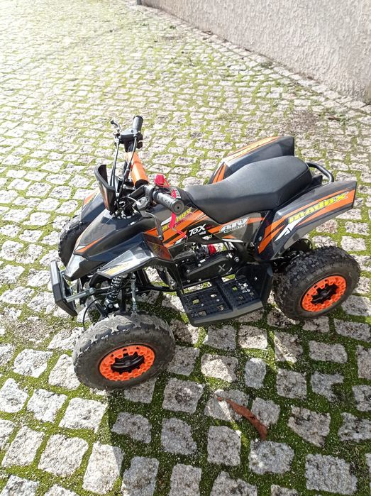 Moto 4 infantil muito estimada