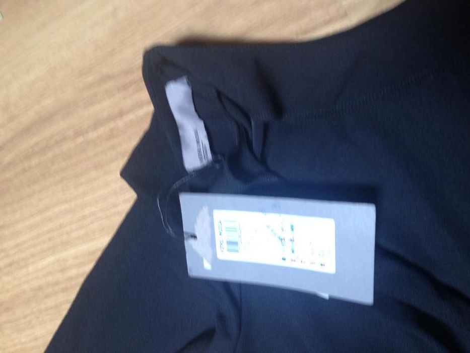 Macacão preto com costas abertas em V- Novo com etiqueta