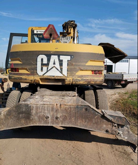 Продам екскаватор CAT