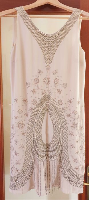 Vestido cru e dourado da marca Suite Blanco