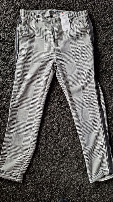 Nowe z metką spodnie w kratkę Reserved 38