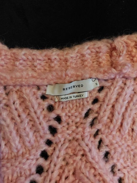 Rozpinany bezrękawnik damski