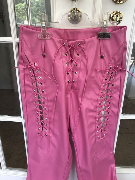Calças em pele rosa com cordões (38/M)