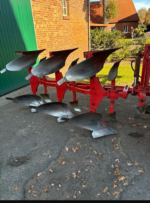 Плуг обертовий трьох корпусний