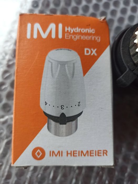 Термоголовка на радиатор отопления Германия