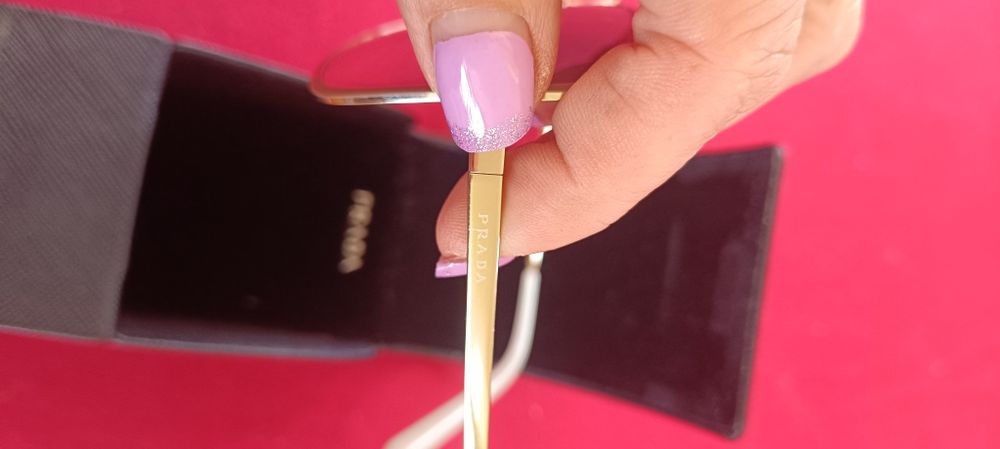 Óculos Prada modelo  PR 60 XS