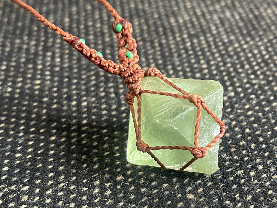 Macramé necklace with a raw light-green natural stone