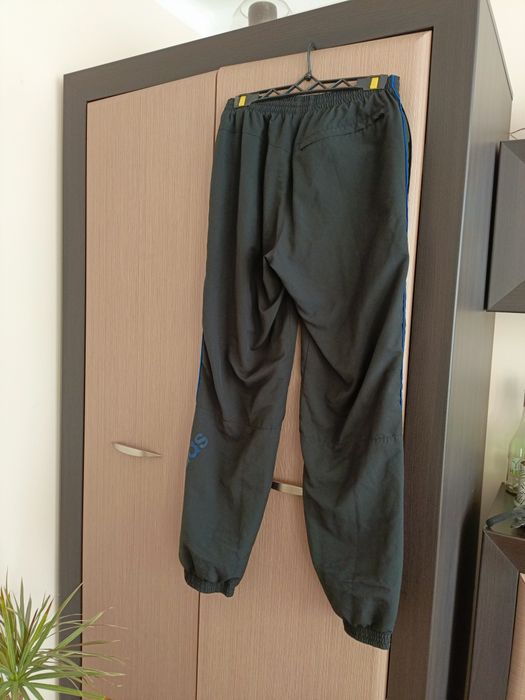 Męskie spodnie dresowe ortalionowe Adidas rozmiar M/L czarne
