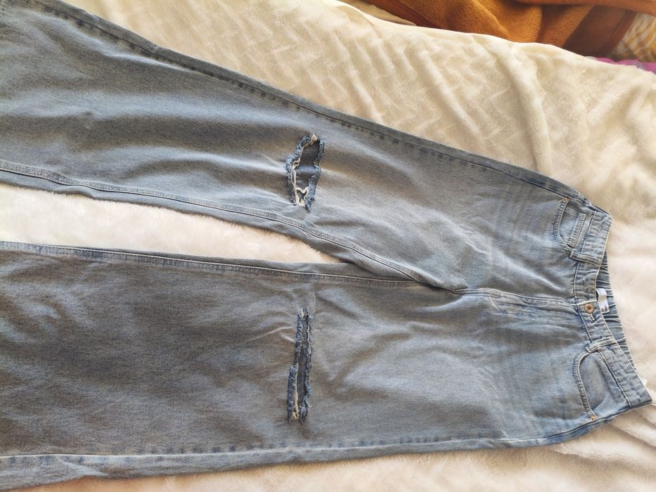 Spodnie jeansy nowe bez metki Sinsay M/L.