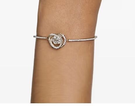 Bransoletka typu bangle w odcieniu złota NOWA Swarovski