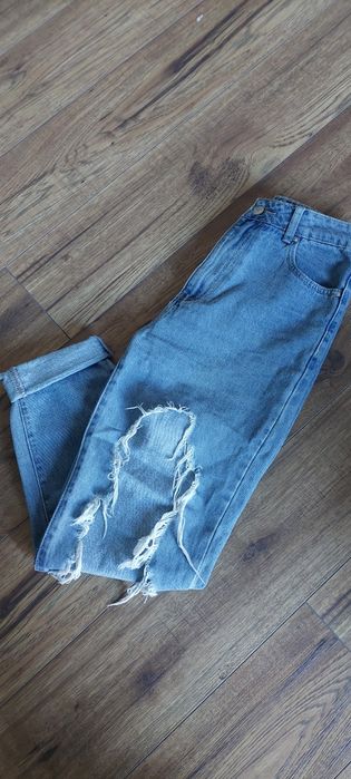 Spodnie jeansowe damskie z rozdarciami Cropp  Xs.