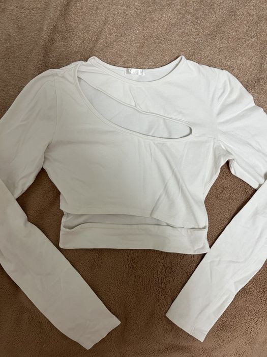 Білий логотип з вирізами