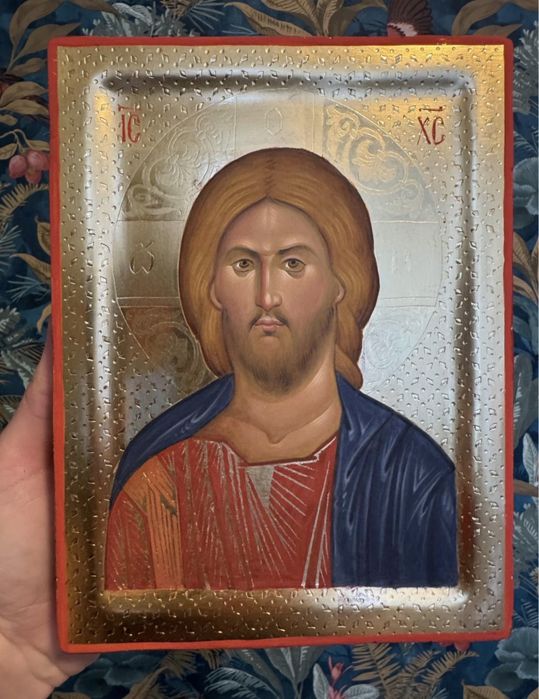 Three handmade icons on gold background. Jesus Christ, Madonna, archangel Michael.