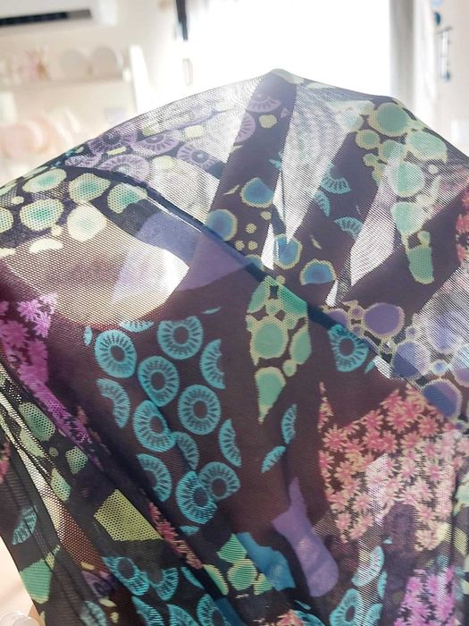 Calça rede semi-transparente