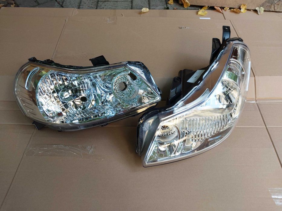 SUZUKI SX4 2006 -lampa przednia lewa + prawa komplet