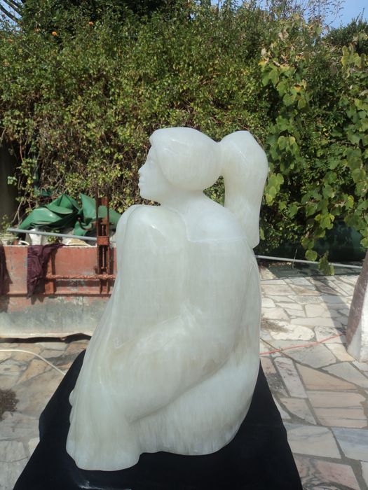 Escultura em pedra onix