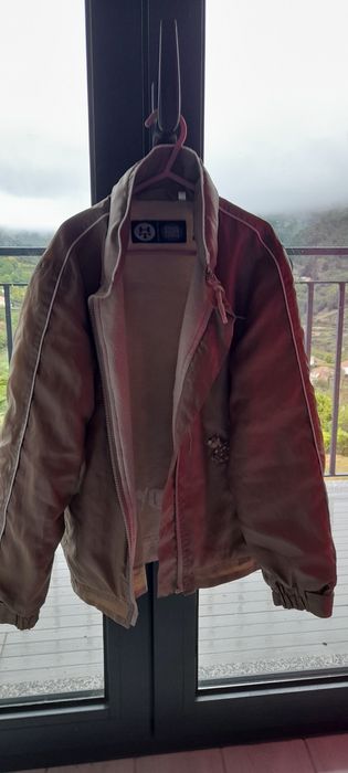 Casaco impermeável beje 9 anos menina