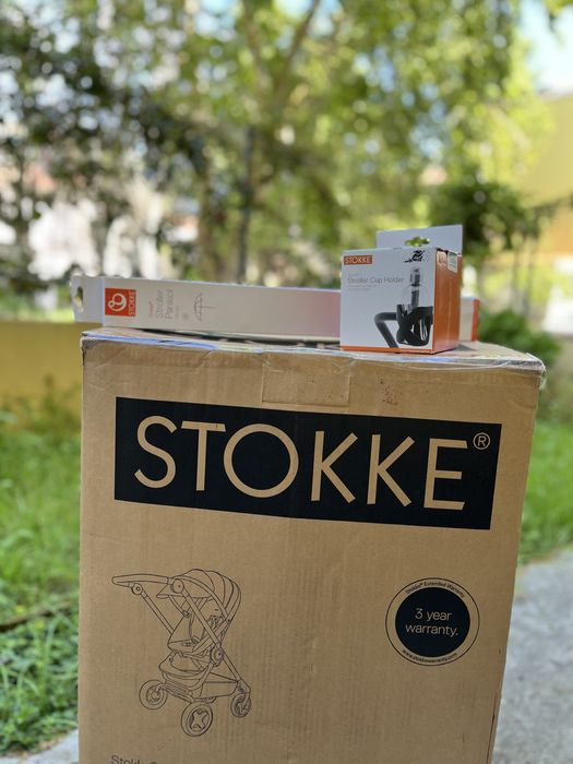 Carrinho de bebé Stokke + capa de chuva + acessórios