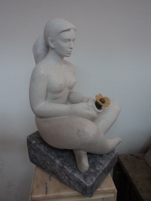 Escultura em mármore líoz