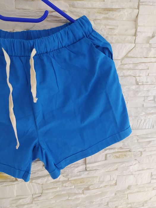 Nowe niebieskie spodenki kieszonki 38/40