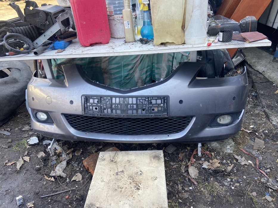 Передний бампер мазда 3бк телевизор уселитель капот