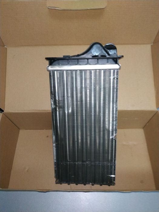 Продам радиатор печки Пежо 206