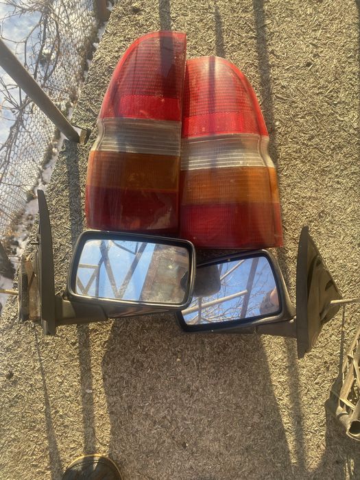 Продам стопи і зеркала на форт ескорт