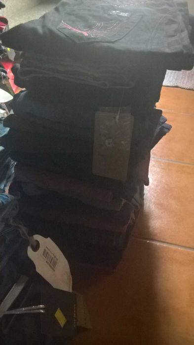 lote de 77 calças para mulher .novas com etiqueta