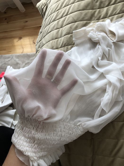 Ewa Minge Biała elegancka bluzka wiązana na szyi